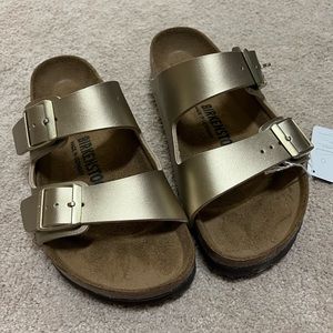 Size 36, Gold Birkenstock sandals, Still with tag (I wear 6.5 and they fit).